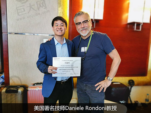 邱星明与美国技师Daniele Rondoni合影